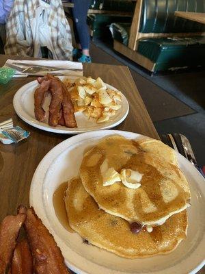 Short stack blueberry pancakes and locally sourced bacon with house made American hash browns.