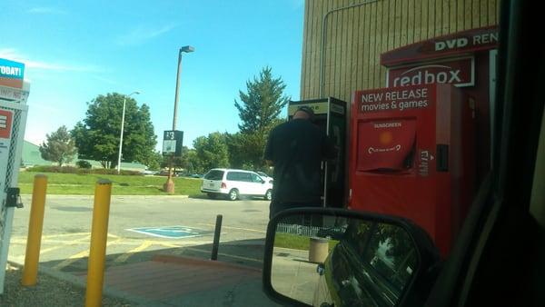 One of the last people on earth actually using a pay phone