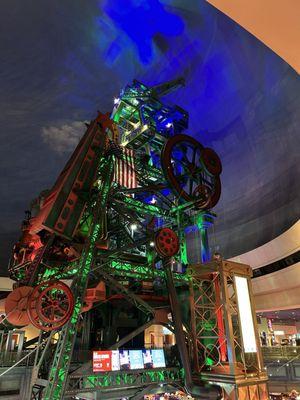 Mining contraption in the center of the casino with a bar/lounge underneath.