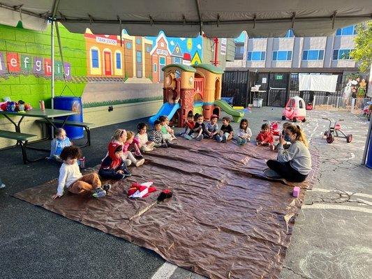 Yoga or is it circle time in the play area?