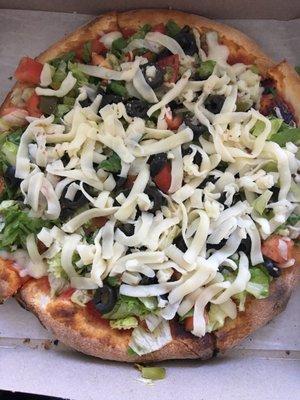 Mini salad pizza with cold cheese