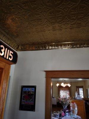 Stunning old tin ceiling.