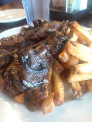 8-ounce steak and fries, with mushrooms. $8 on steak night. Mushrooms cost extra.