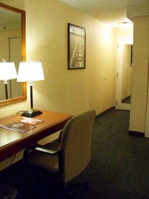 desk and doorway into room Inn of Chicago