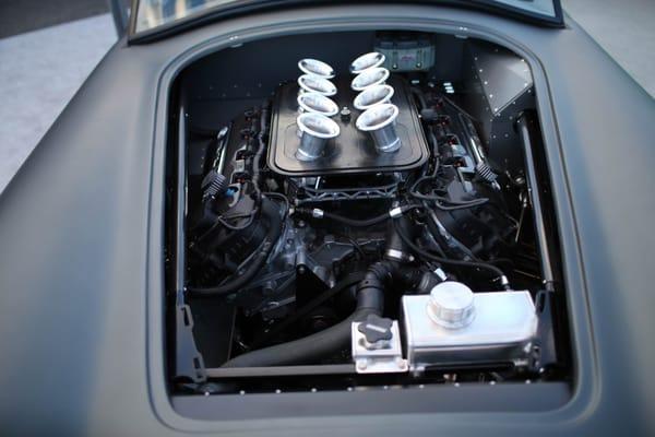 All the engine bay sheet metal was powder coated by them. Hood mounts, power steering brackets, etc.