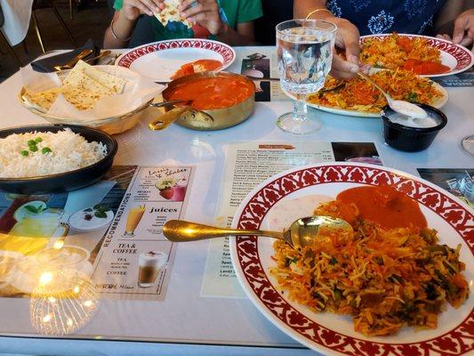 Perfect pairs Naan and Paneer Makhani, Biryani and raitha.