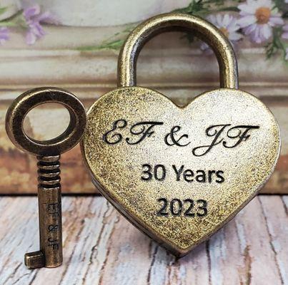 Laser engraving a special message on a LOVE LOCK and KEY (loved one memorial memory romance anniversary wedding bride engagement fiance)