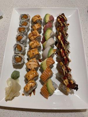 R to L: spicy salmon, Jana sushi roll, rainbow roll, fire dragon roll