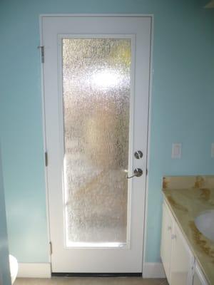 New Pre-hung Door with Rain obscured glass.