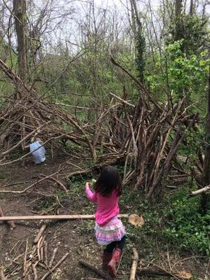 Exploring the child-made "forts" on the nature trails