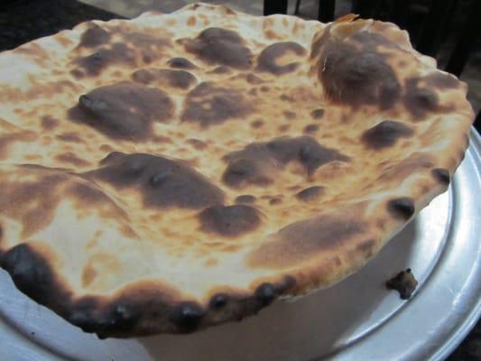 Huge bread the size of a super large pizza