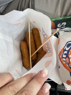 Mozzarella sticks served with marinara.