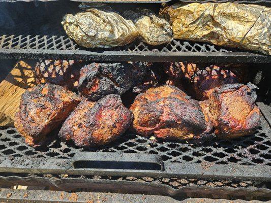 Pork shoulder and wrapped brisket.