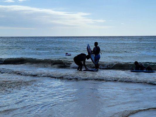 Ethan and Nick boogie boarding at Hapuna Beach on 7/28/23