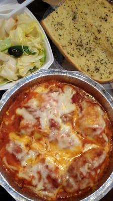 Under the cheesy goodness was a pasta combo stuffed shells, ravioli and manicotti. Paired with salad and garlic bread for 10.50