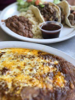 Brisket tacos and beef/cheese enchiladas