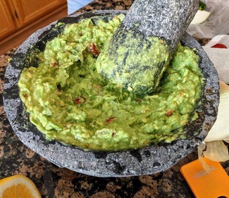 Molcajete works incredibly well. Very delicious guacamole :)