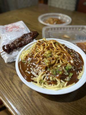 Cold Sesame noodles(before mixing it up) and beef on the stick. Both were awesome.