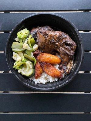 Jerk Chicken with plantains, plain rice, and steamed veggies.