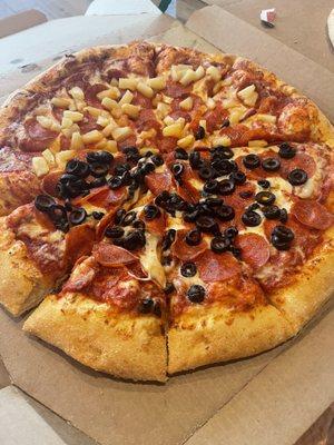 Pepperoni with black olives on half & pineapple on half