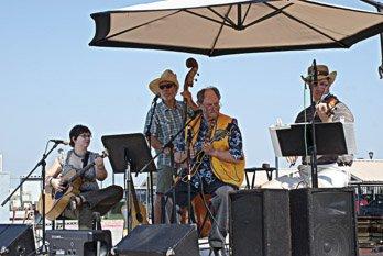 Local entertainers play at the Frisco Rotary Farmers Market most Saturdays!