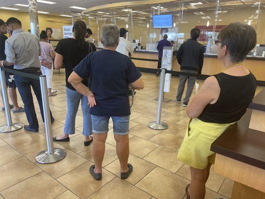 16-20 people in line for tellers, 9 bank staff members in, taking apx 45-50 minutes in line, do not recommend this particular Wells Fargo