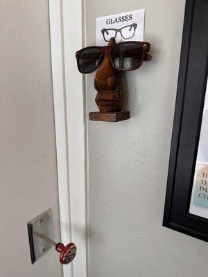 Love this glasses holder in the changing rooms.