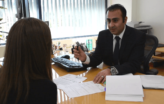 Attorney Benjamin Drake meeting with a client.