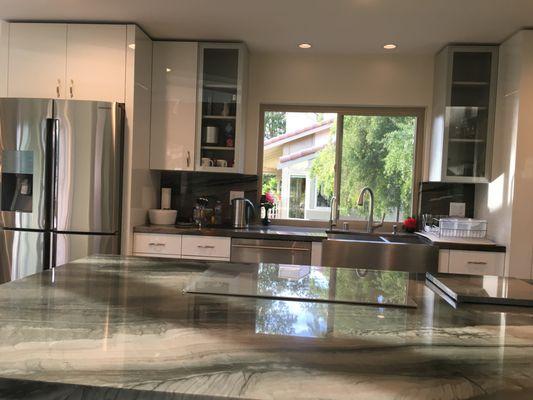 New cabinets, new farmers sink and new island with quartzite from the Galapagos Islands that was formed 15 million years (metamorphic rock)