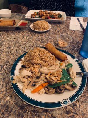 Chicken Almond with rice and egg roll; Kung Pao Tofu, veggie rolls