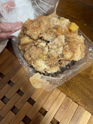 Soggy bread with cinnamon and peaches.(peach cobbler )