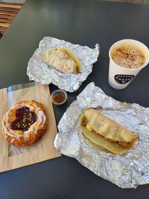 Breakfast tacos, pastry, and latte