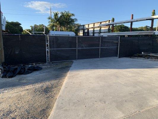 Commercial Chain Link Fence and Gate with Black Fabric