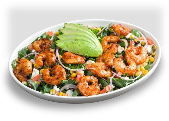 Grilled Shrimp & Avocado Salad, shrimp, kale, seasoned olive oil, avocado, corn, tomato, feta, red onion, parsley, with a lime vinaigrette.