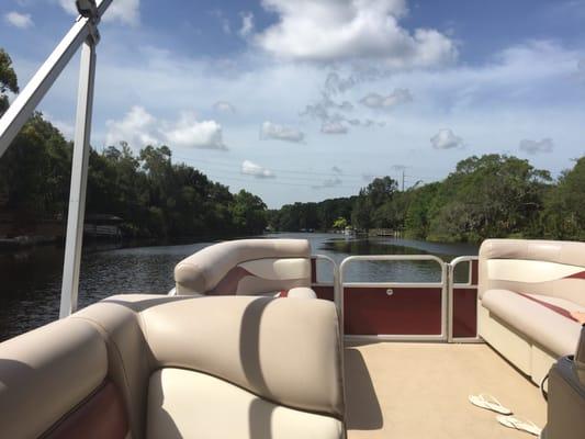 Enjoying a lazy Sunday aboard Freedom Boat Club's Sweetwater pontoon. (June 2016)