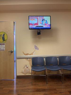 Tv in waiting area for sick patients.