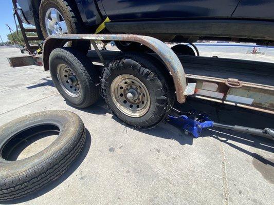 The old tire that was on the trailer when I bought it; Shane told me tire age is very important (less than 5 years is ideal)!