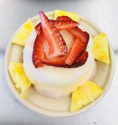 Tropical bowl, fresh pineapple and strawberry.