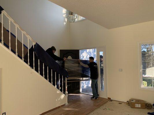 Moda movers carefully moved a 400+ lb vanity. Beforehand, they covered banister, walls, & doors. This was my second move with them.