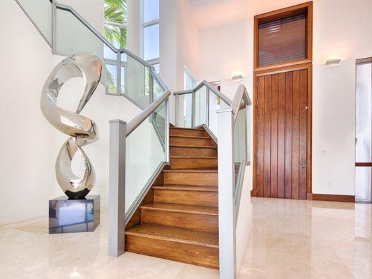 Dramatic entry way set the tone to this double volume stunning intercostal home