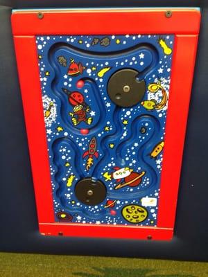 Wall mounted motor skills game