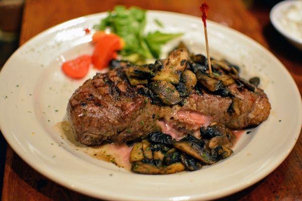 Stuffed New Yorker - Char Grilled 14oz. New York Strip Stuffed with Fresh Herbs, Gulf Shrimp, Provolone, and Fontinella Cheese