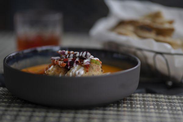 Goats Cheese Kofta.    Semolina crusted potato croquettes served in a tomato-honey sauce.          Photo by @mtoddphotography