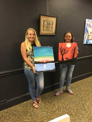 Proud creatives with their finished paintings from our Teen Munch & Paint