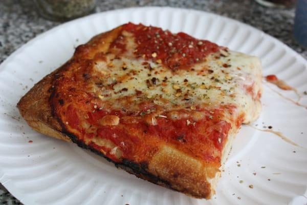 mmm... yummy slice.. crispy crust, not dry, with yummy tomato sauce and cheese