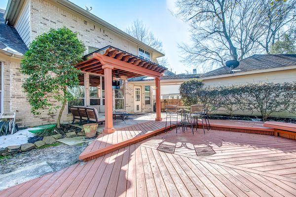 covered patio with beautiful deck