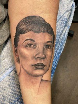 Black and grey portrait tattooed by Anthony