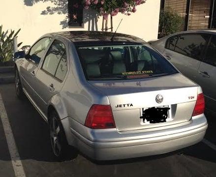 My car 1 year after Midway Industries painted it, still glossy and shiny. (probably should wax it soon)...