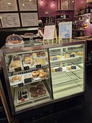 The pastries and baked goods display case. They now have fresh gigantic New York bagels, which are shipped daily to the Coffee House.