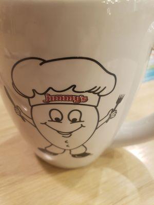 Coffee mug is cute. Eating a full bfast